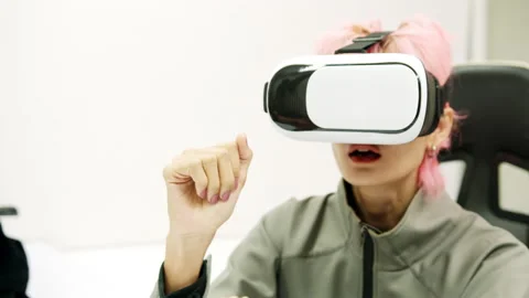 Female Using Gestures with Hands VR goggles headset modern technology Stock Footage 166442261
