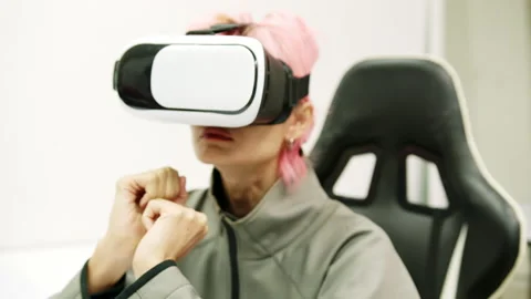 Female Using Gestures with Hands VR goggles headset modern technology Stock Footage 166442560