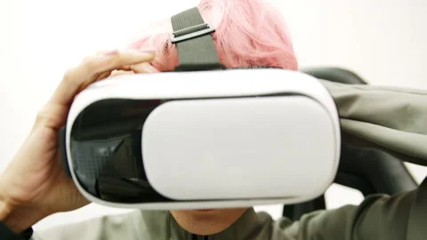Female Using Gestures with Hands VR goggles headset modern technology Stock Footage 166443199