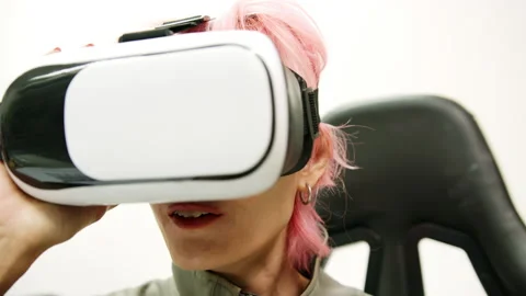 Female Using Gestures with Hands VR goggles headset modern technology Stock Footage 166443691