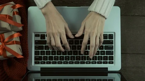 Female using laptop computer for send e-mail greetings in Christmas day Video stock 81415016