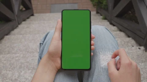 Female Using Mobile Phone With Green Screen Mockup Chroma Key. Person Holdi.. Stock Footage 330132261