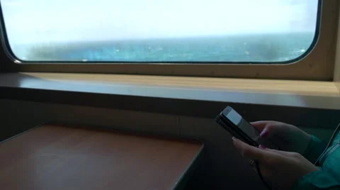 Female using Smartphone on a Boat. 動画素材 65306674