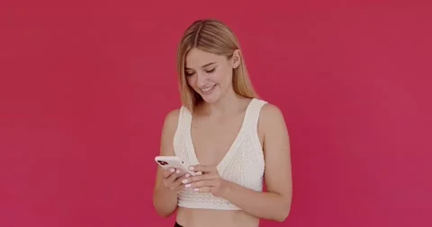 Female using smartphone, checking social networks, having concentrated Stock Footage 218429071