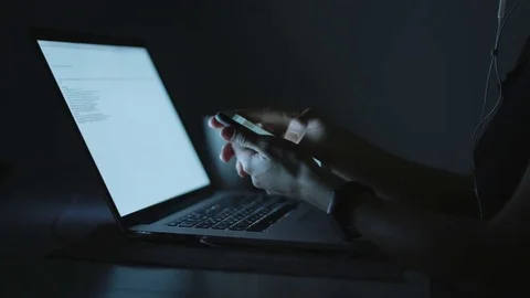 Female using smartphone in evening Stock Footage 70787860