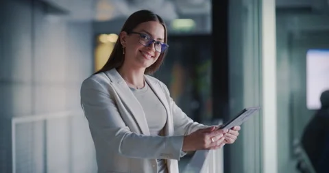 Female Using Tablet Computer in Office Stock Footage 295785396