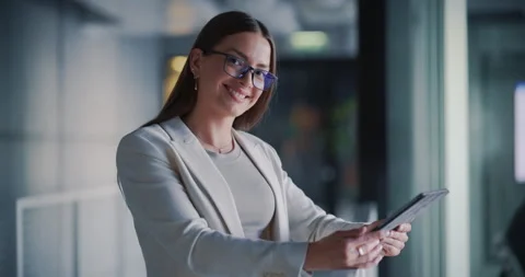 Female Using Tablet Computer in Office Stock Footage 295785417