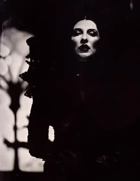 Female vampire stands in front of gothic window. Wetplate collodion (1 of 4) Stock Photos