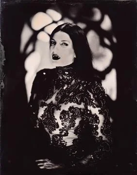 Female vampire stands in front of gothic window. Wetplate collodion (3 of 4) Stock Photos