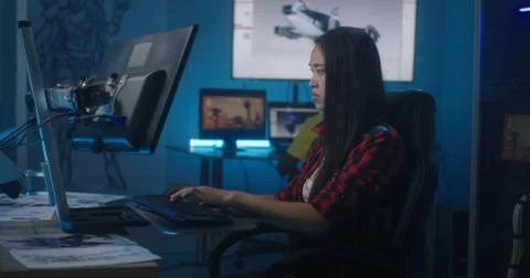 Female video game developer at work Stock Photos