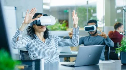 Female Virtual Reality Engineer/ Developer Wearing Virtual Reality Headset Stock Photos
