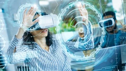 Female Virtual Reality Engineer/ Developer Wearing Virtual Reality Headset Stock Photos