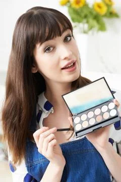 Female Vlogger Presenting Make Up Tutorial Video Stock Photos