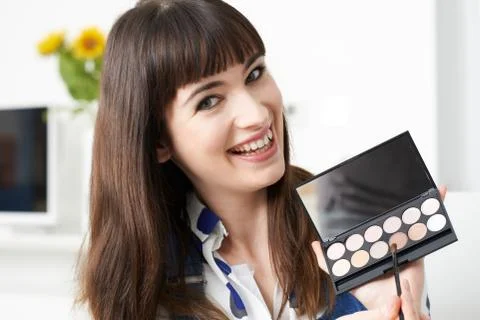 Female Vlogger Presenting Make Up Tutorial Video 写真素材