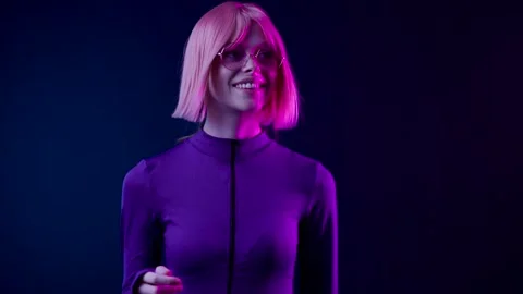 Female in VR glasses interacting with network while having virtual reality. Stock Footage 261287773