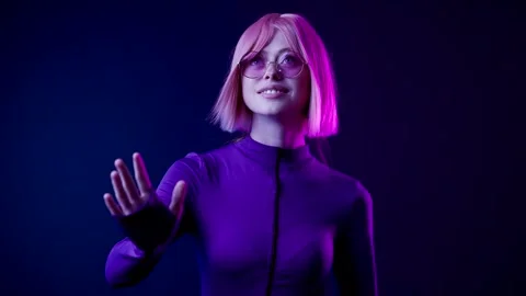 Female in VR glasses interacting with network while having virtual reality. Stock Footage 261287994
