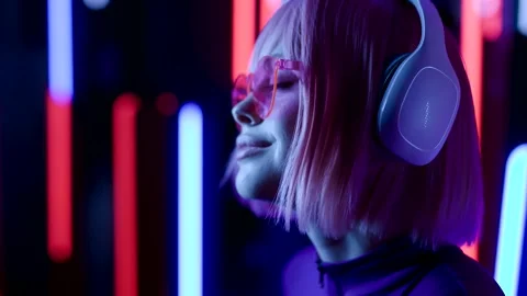 Female in VR glasses interacting with network while having virtual reality. Stock Footage 261944285