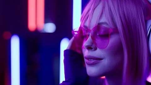 Female in VR glasses interacting with network while having virtual reality. Stock Footage 261944404