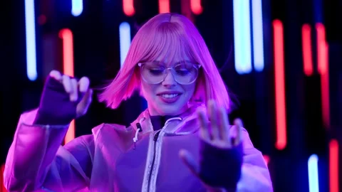 Female in VR glasses interacting with network while having virtual reality. Stock Footage 261979520