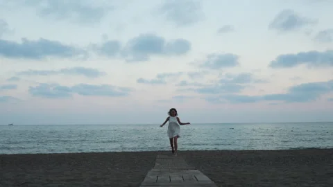 Female walking on the beach. Stock Footage 278116492