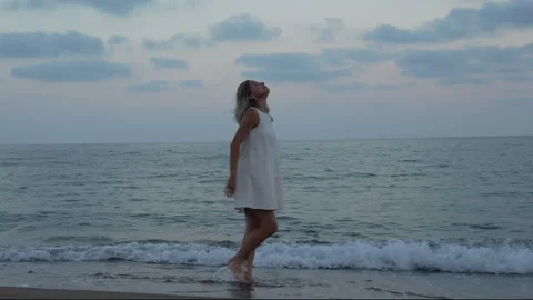 Female walking on the beach. Stock Footage 278116646