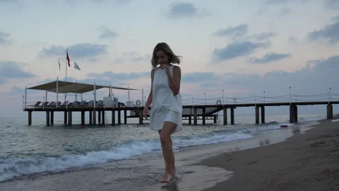 Female walking on the beach. Stock Footage 278117169