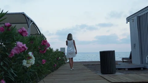 Female walking on the beach. Stock Footage 278117410