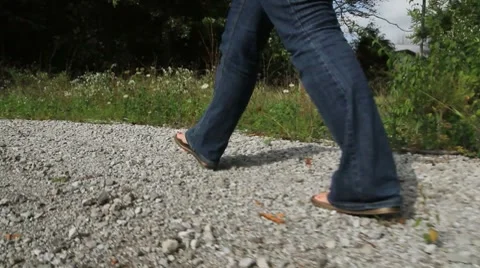 Female walks on rocky path Stock-Footage 8694471