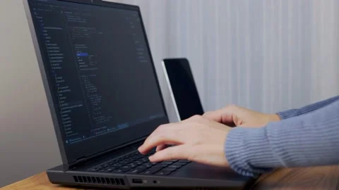 Female Web Developer Develops a Web Application, Close-up. Debugger Encodes. The Vidéo 144884971