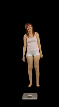 Female on weight scale Stock Footage 8948363
