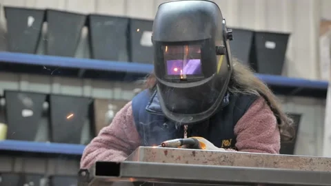 Female welding operator Stock Footage 168124086