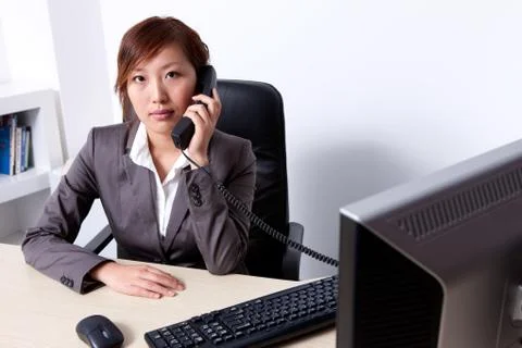 A female white-collar worker Stock Photos