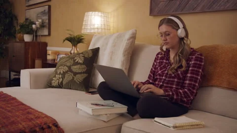 Female Work From Home Study Remote on Couch Living Room 2 24fps  01 Stock Footage 188034851