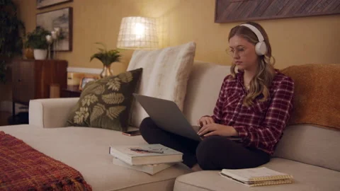 Female Work From Home Study Remote on Couch Living Room 2 24fps Stock Footage 188035629