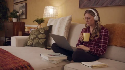 Female Work From Home Study Remote on Couch Living Room 24fps Stock Footage 188042965