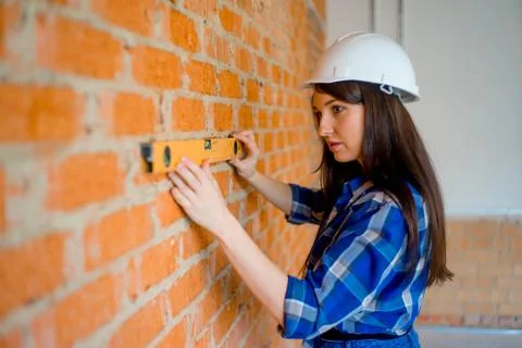 Female worker on construction site Stock Photos