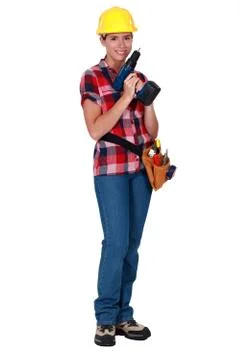 Female worker with a drill Stock Photos