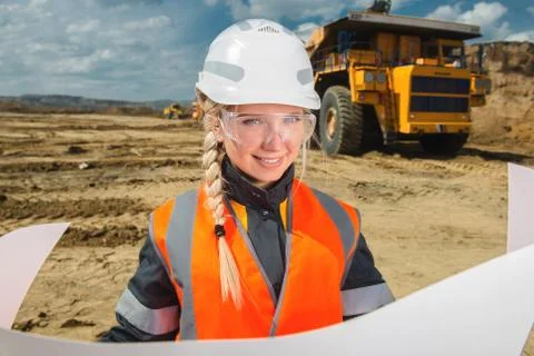 Female worker at an open pit Stock Photos