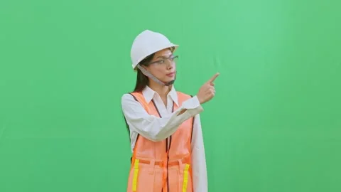 Female Worker Pointing Up to Copy Space for Title Video stock 331856041