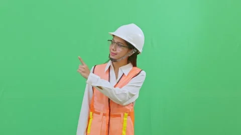 Female Worker Pointing Up to Copy Space for Title Stock-Footage 331856134