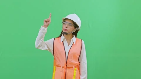 Female Worker Pointing Up to Copy Space for Title Video stock 331856622