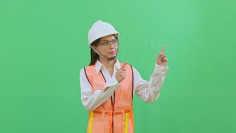 Female Worker Pointing Up to Copy Space for Title Stock-Footage 331856663