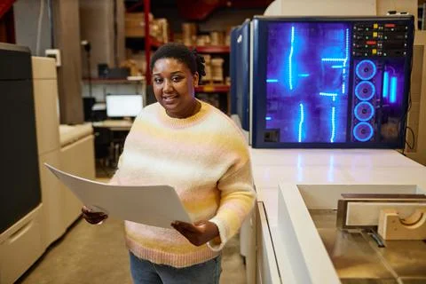 Female Worker in Printshop Stock Photos