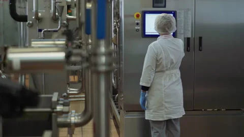 Female Worker is touching the Control Panel Screen. Milk Processing Machines. 스톡 동영상 269141123