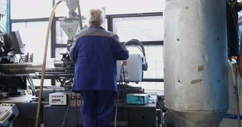 Female worker at work in the plastics recycling plant Stock Footage 87634895