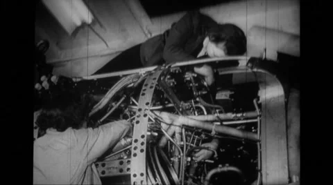 Female worker working on engine section of B-24 Liberator Stock Footage 39913934