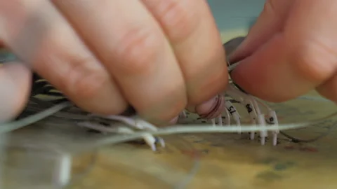 Female Worker is Wrapping the Silver String around the Wires at Electronic plant Video stock 202094853