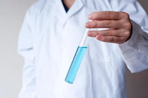 Female workers doing the experiment Foto stock