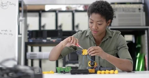 Female working on robotics Stock Footage 86811836