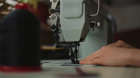 Female working with the sewing machine Stock Footage 61034232